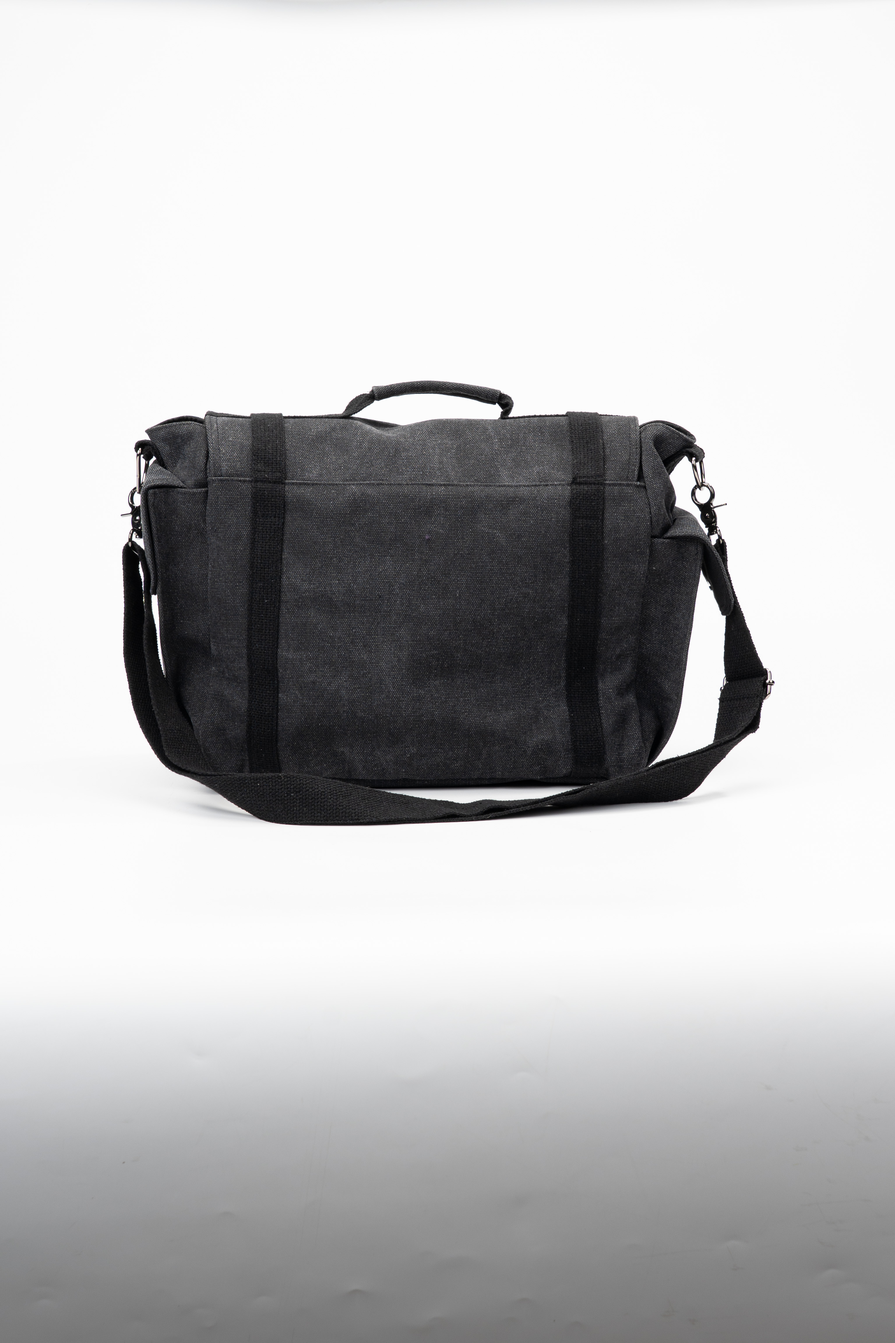 Black canvas messenger backpack sample on white background